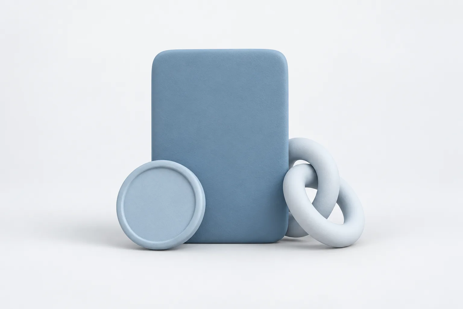 A rounded clay name card standing upright beside a small clay seal and a clay link ring, in soft horizon blue tones on a near-white studio plate